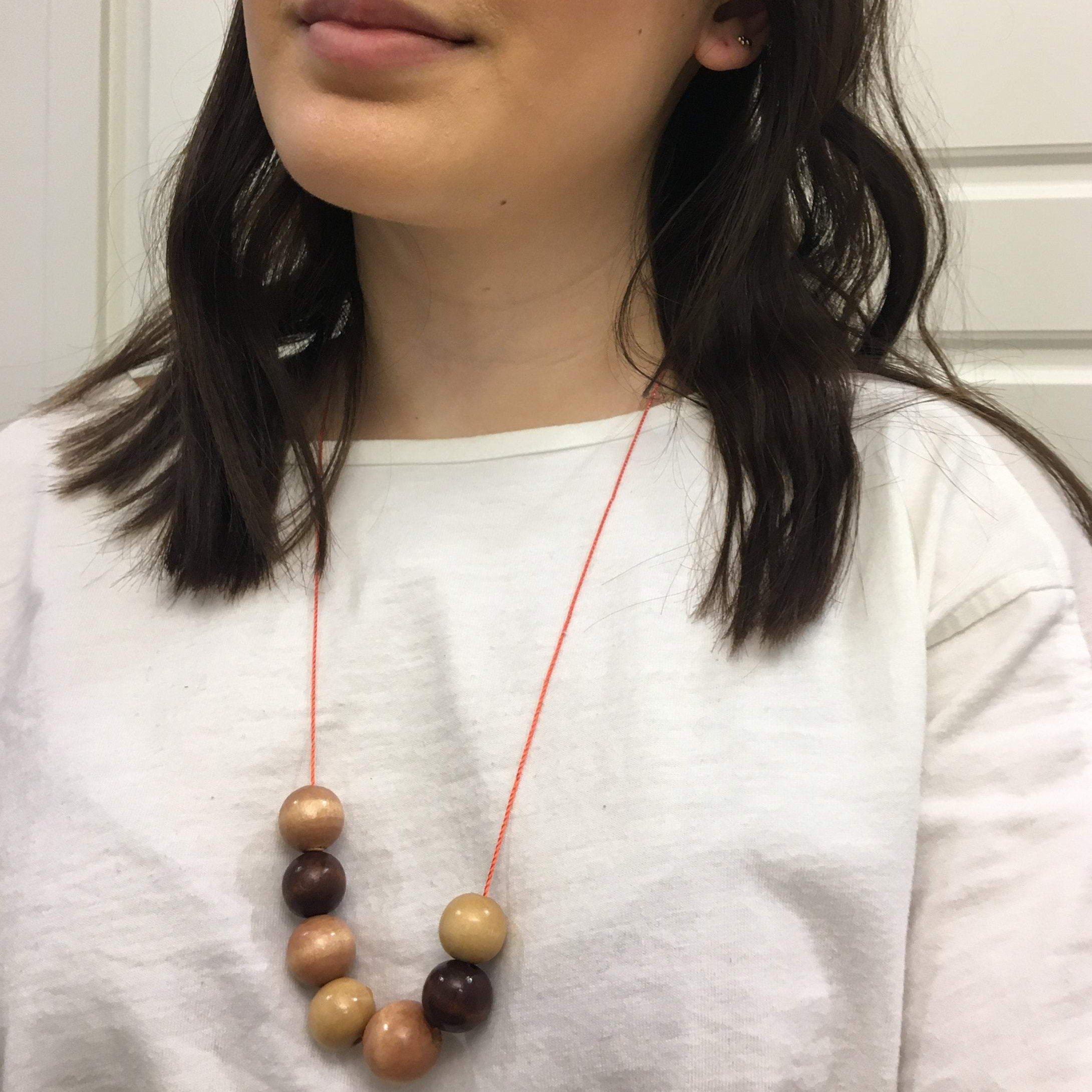 Buy Asymmetrical Orange Wood Bead Necklace Recycled Upcycled Beads  Transparent Elastic Thread and Carabiner Clasp and Silver Ring Online in  India - Etsy